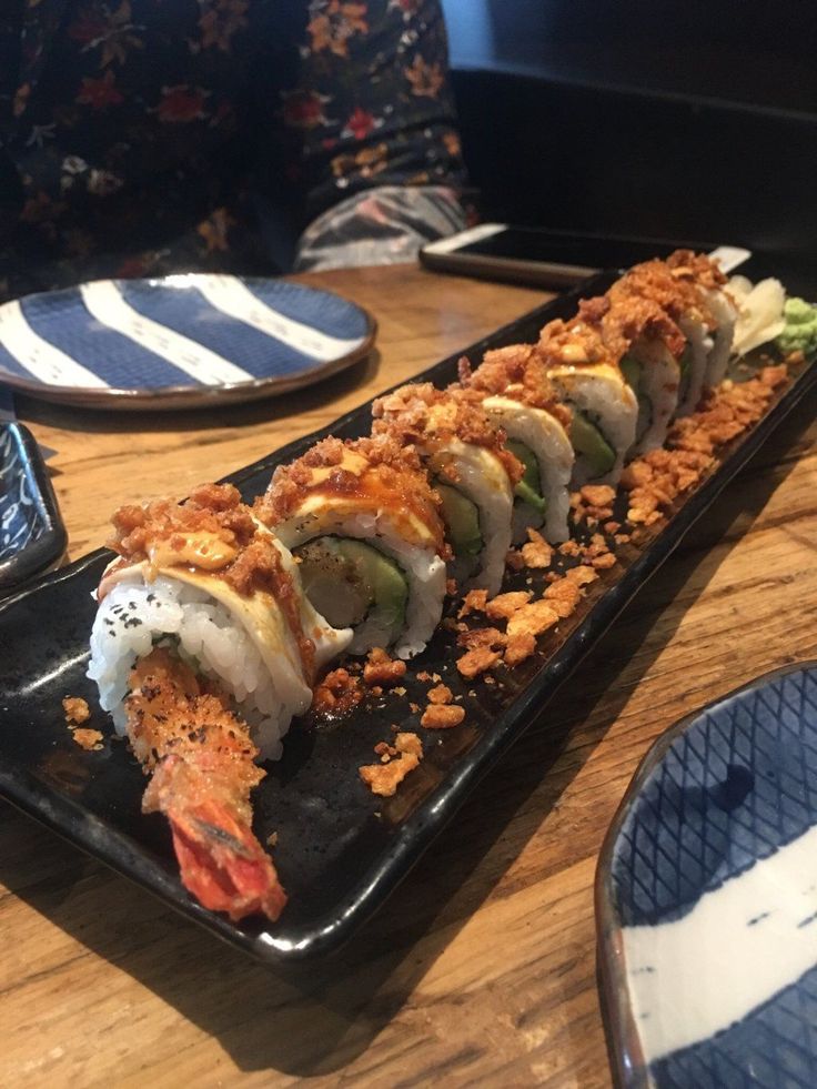 there is a sushi dish on the table ready to be eaten at this restaurant