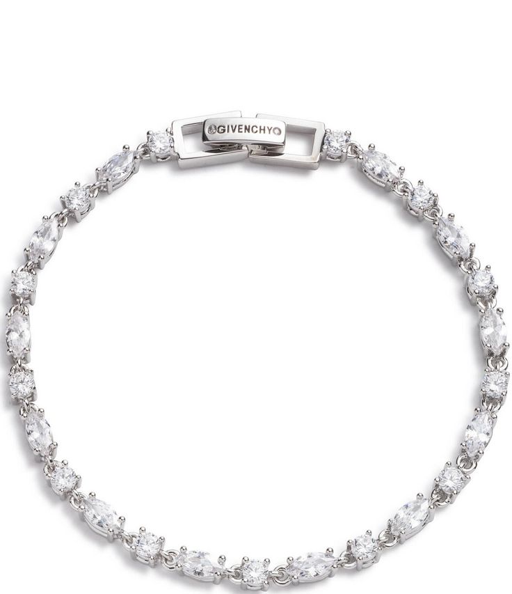 From Givenchy&#x2C; this bracelet features: Line braceletSilver-tone platingFold-over closure Approx. 7.25" length Imported. Chain Bracelet Stack, Silver Designer Bracelet, Silver Jewelry On Tan Skin, Branded Bracelets, Jewelry Silver Bracelets, Givenchy Bracelet, Silver Bracelet Stack, Jewelry Closet, Couples Bracelets