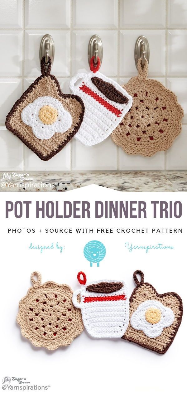 crocheted pot holders are hanging from hooks