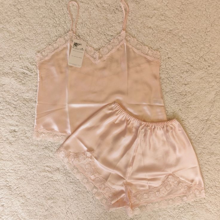 Nwt Silk Pajama Set Satin Pink Camisole And Shorts With Polyester Lace Sizes: M, L Offers Welcome! More Silk Lingerie And Panty Set Options Available In My Closet! Size M Measurements (Approx Laying Flat): Cami- Width 18.5 In, Length 20.75 In Shorts- Waist 12.5-21 In, Length 12 In Size L Measurements (Approx Laying Flat): Cami- Width 21 In, Length 21.5 Shorts- Waist 14-22 In, Length 13.5 In Cami And Shorts Pajamas, Silk Cami Pajama Set, Silk Pink Pajamas, Silk Shorts Pajamas, Coquette Pajama Set, Silk Pjs Aesthetic, Girly Pjs, Pink Satin Pajamas, Sleepwear Women Nightwear