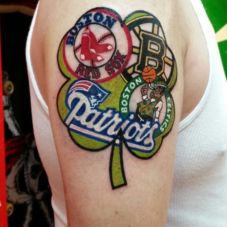 a man with a boston red sox tattoo on his arm