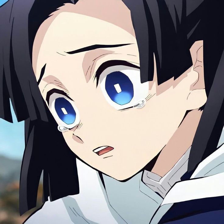 an anime character with blue eyes staring at the camera