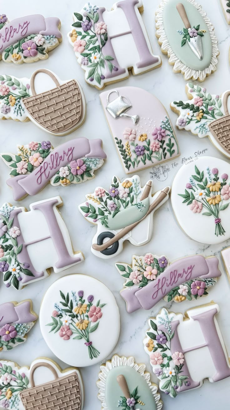 some decorated cookies are laying on a table