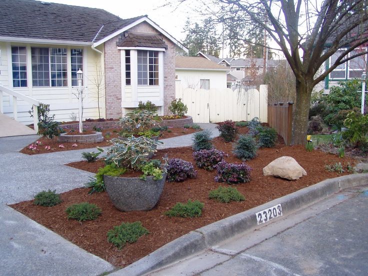 the front yard is clean and ready to be used as a landscaping area for this home