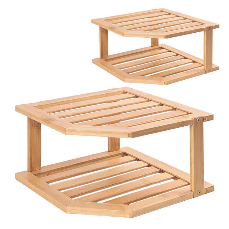 two wooden shelves sitting next to each other