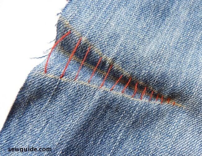 the stitchs on this pair of jeans have been sewn