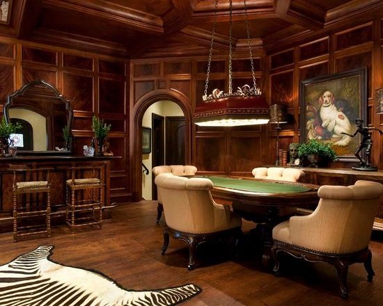 an elegant dining room with wood paneling and zebra rug