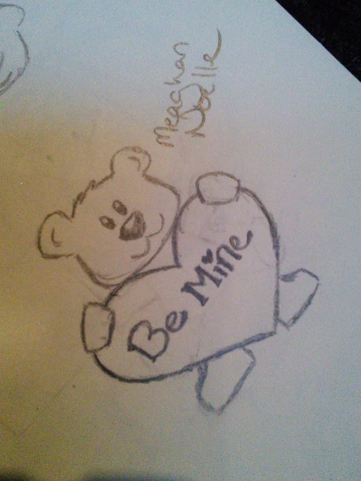 a drawing of a teddy bear holding a heart with the words be mine written on it