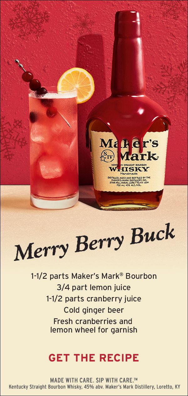 a bottle of merry berry buck next to a glass with a lemon slice on it