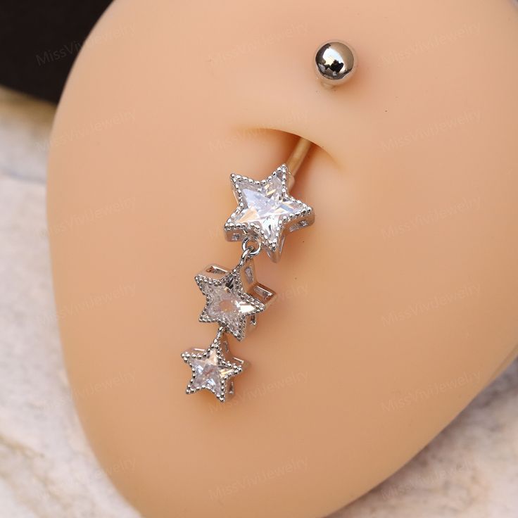 a close up of a fake dummy with an earring on it's side