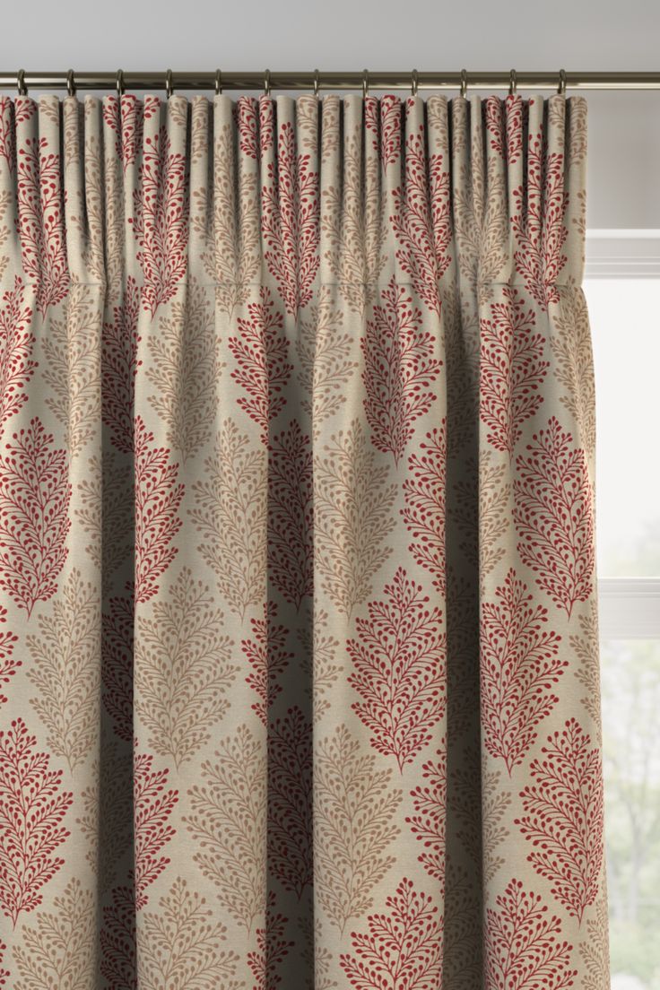 a curtain with red and white designs on it