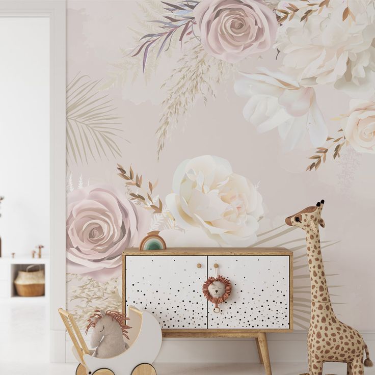 a baby's room with a floral wallpaper and giraffe toy in the foreground