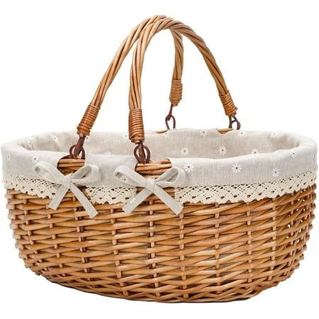 a wicker basket with white lace and bows