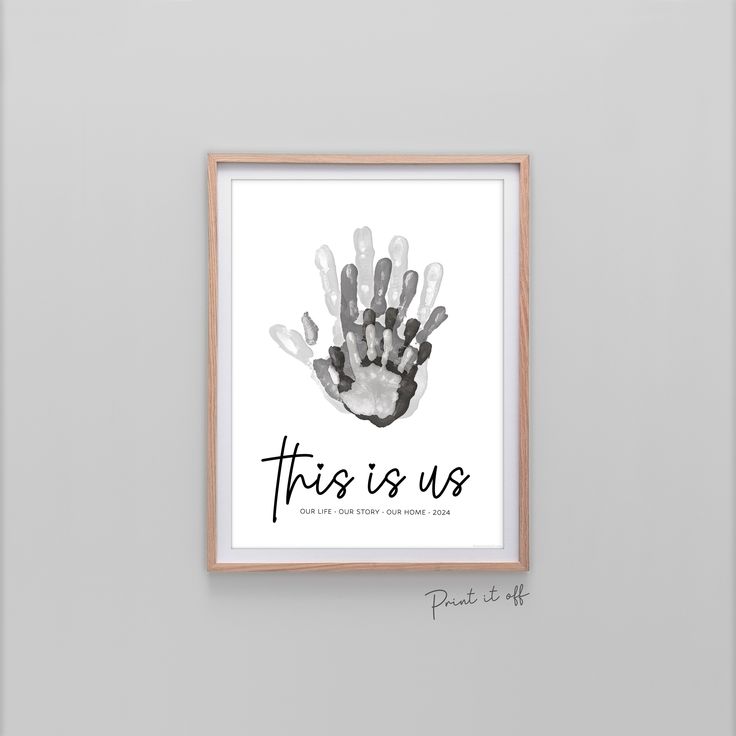 this is us hand print in black and white with the words,'this is us '