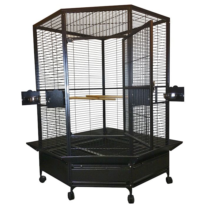 a black bird cage sitting on top of a table