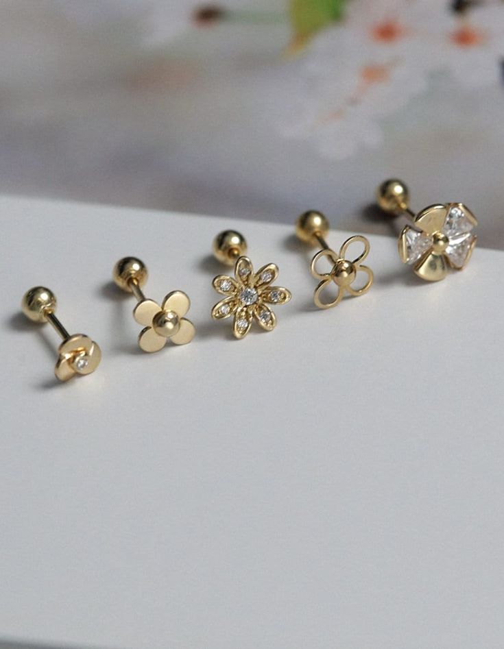 custom order 4-5 weeks. we do not take rush orders.  Come with jewelry bag  1: diameter 4mm  2: 5.7mm  3 : 6.5mm  4 : 6.34mm  5: 6.5mm  earrings are very tiny, please check measurement before purchase  each order is for one single earring. if you need a pair please select qty 2 at checkout. thanks  Any jewelry for pierced ears can not be returned, for hygiene reasons Material: 14k solid gold  Gold Info:  24K gold is 100% pure 18K contains 75% gold and 25% alloyed metals 14K is 58% gold and 42% a Real Gold Earrings Designs, Cheap Gold Chandbalis, Small Earrings Design, Cute Gold Flower-shaped Earrings, Cute Gold Flower Charm Earrings, Cute Gold Flower-shaped Jewelry, Kids Jewelry Gold, Ear Rings Gold, Earrings For Kids