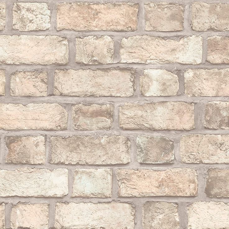 a brick wall made out of grey bricks