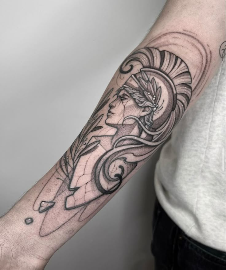 a person with a tattoo on their arm