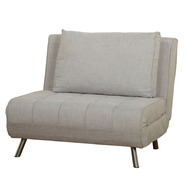 a gray chair with two pillows on it's back and one arm folded up