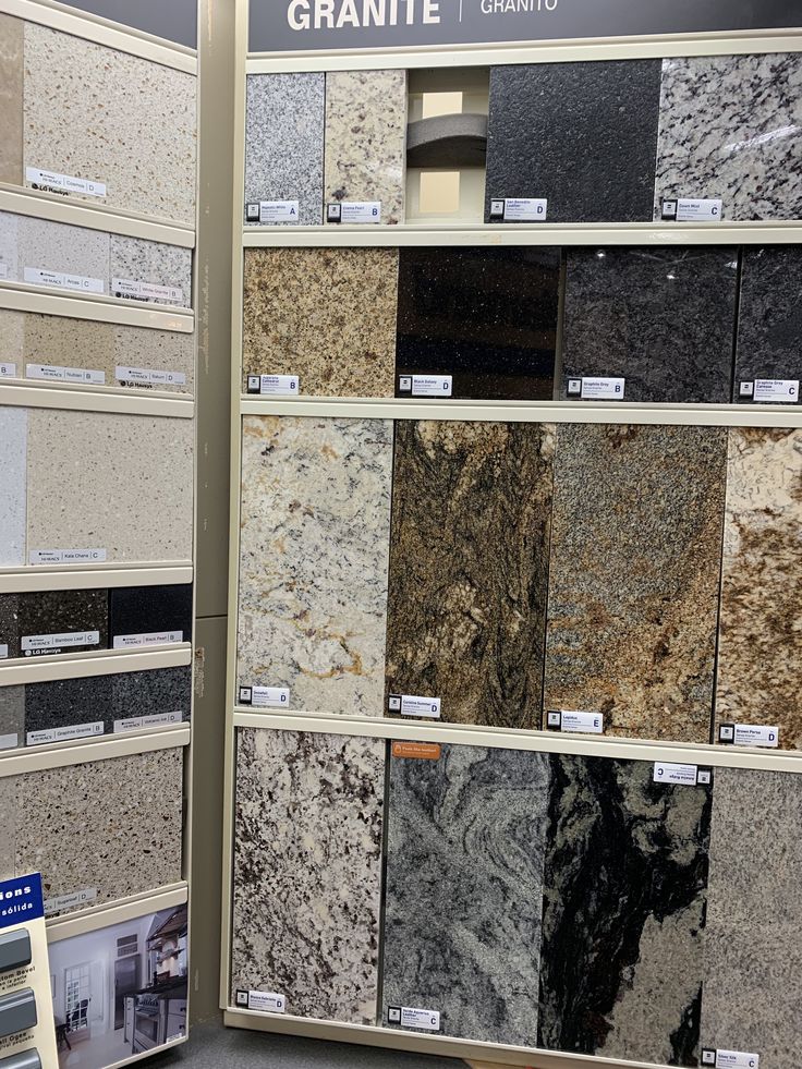 an assortment of granites on display in a store