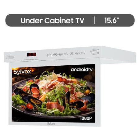 the under cabinet tv has an image of a salad and mussels on it