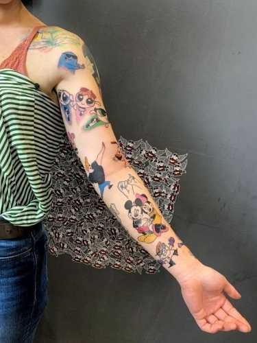 a woman with a tattoo on her arm