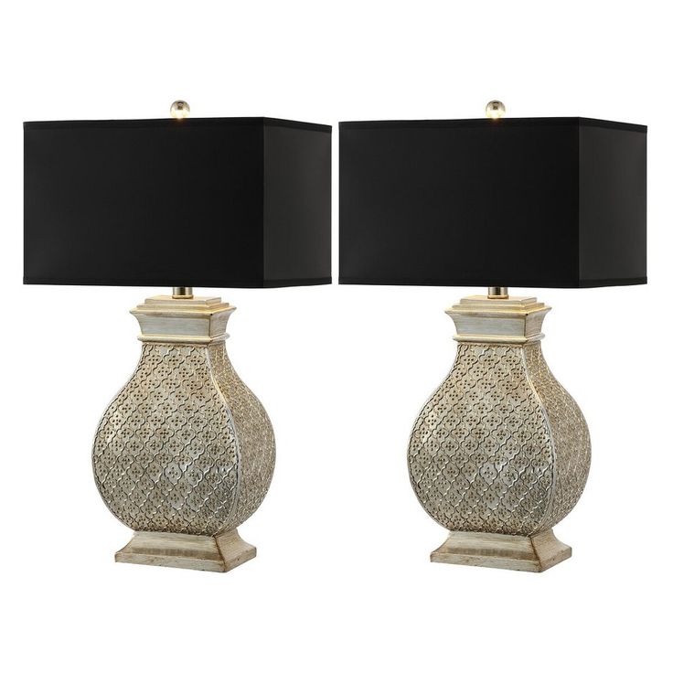 a pair of lamps with black shades on them