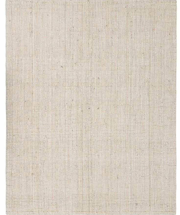 an area rug with white linen on the bottom and beige fabric at the top,