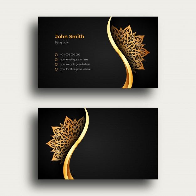 two black and gold business cards with an intricate design on the front, back and sides