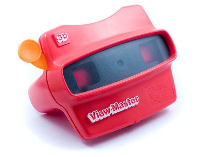 a red toy clock with the word view master on it