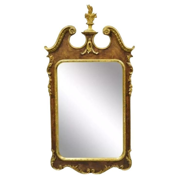 a mirror with an ornate design on it