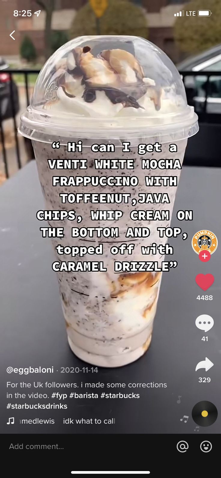 a cup of ice cream sitting on top of a table