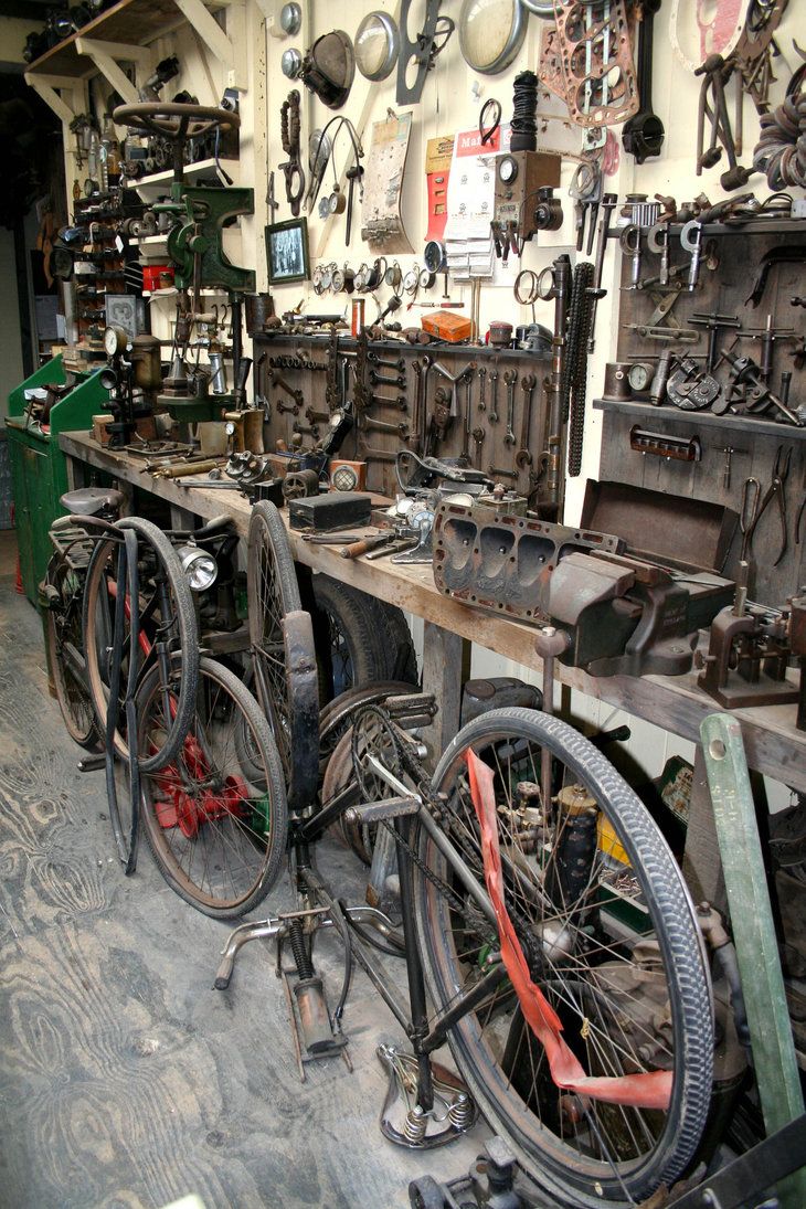 there are many different types of tools in the shop, including bicycles and bicycle parts