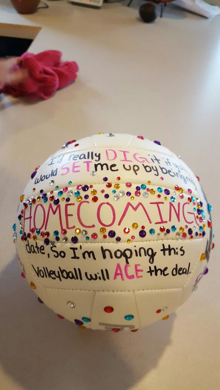 a decorated volleyball sitting on top of a table