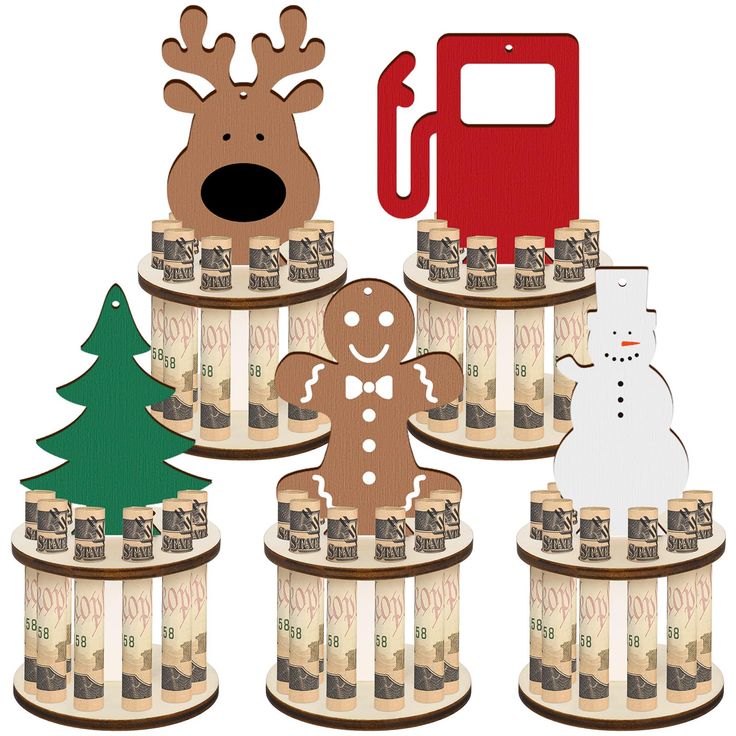 three stacks of money with cut outs of christmas trees and reindeers on each stack