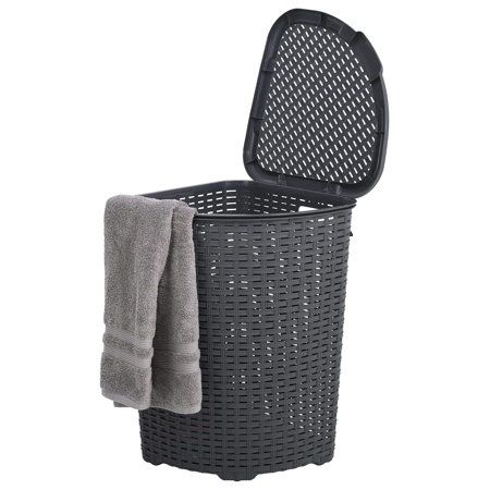 a black laundry basket with a gray towel