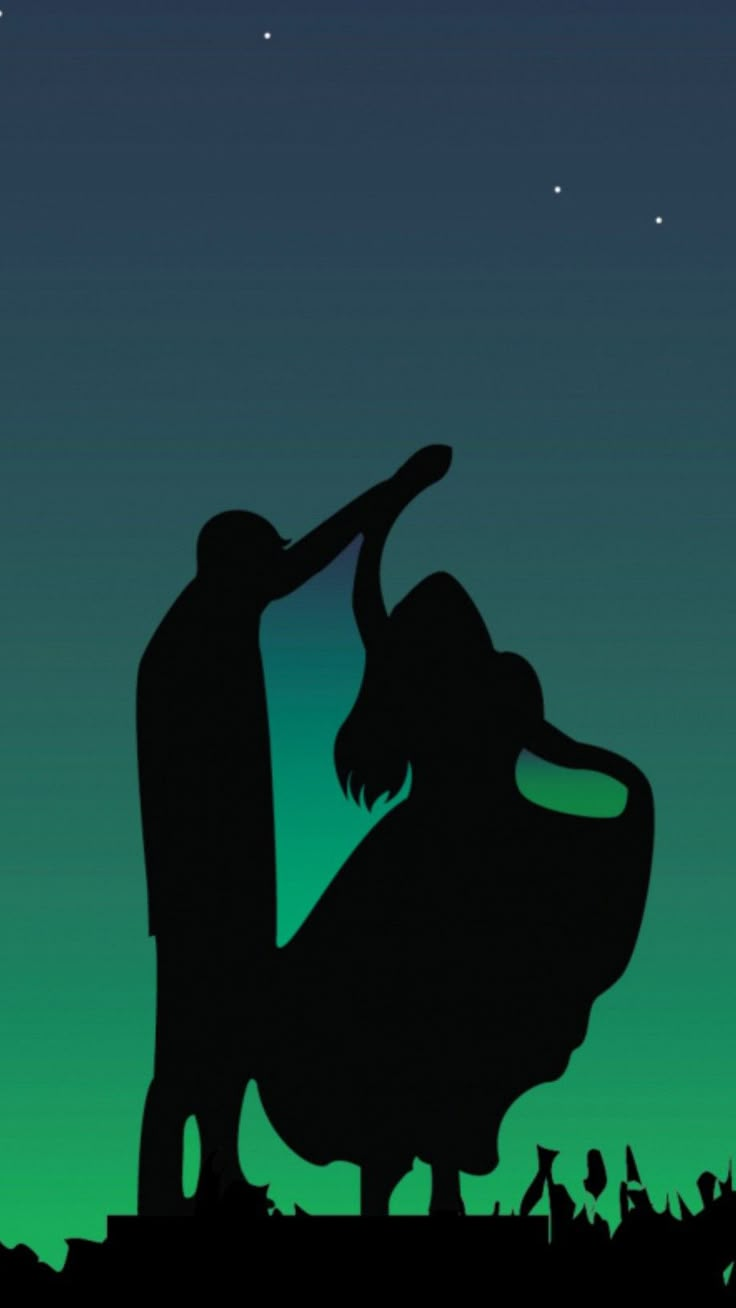 the silhouette of a man and woman dancing in front of a green sky at night