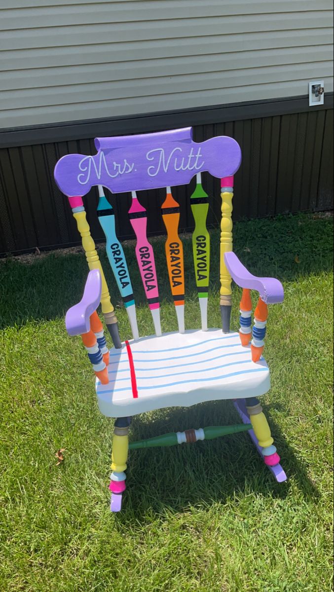 a chair made out of crayons that says mr and mrs math on it