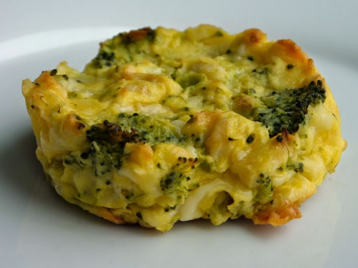 broccoli and cheese casserole on a white plate