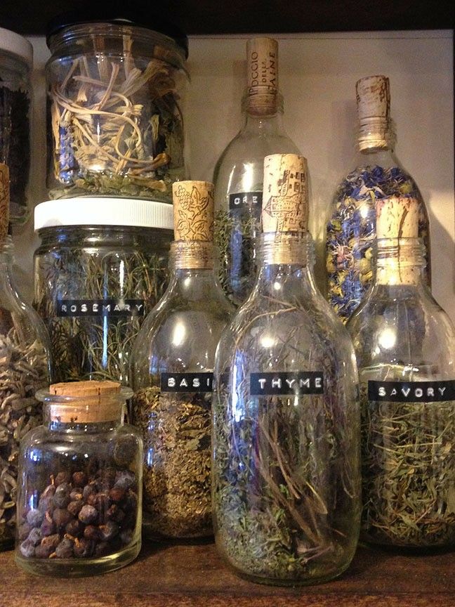 bottles filled with different types of herbs and spices