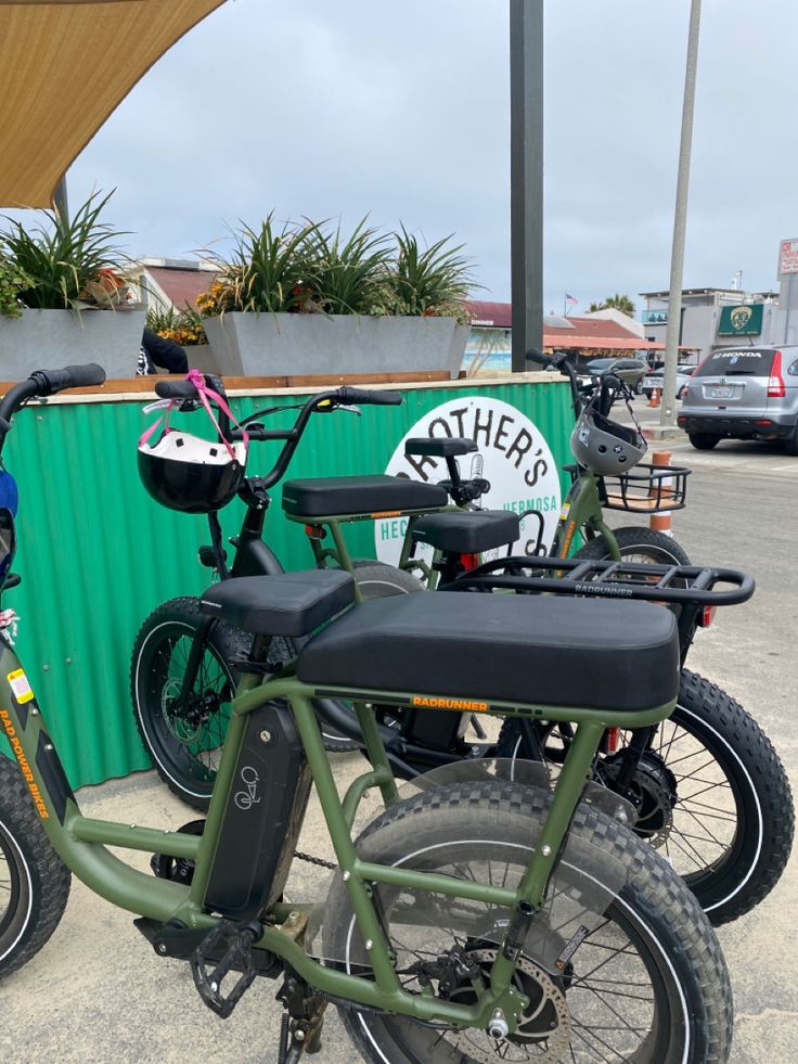 two bikes are parked next to each other