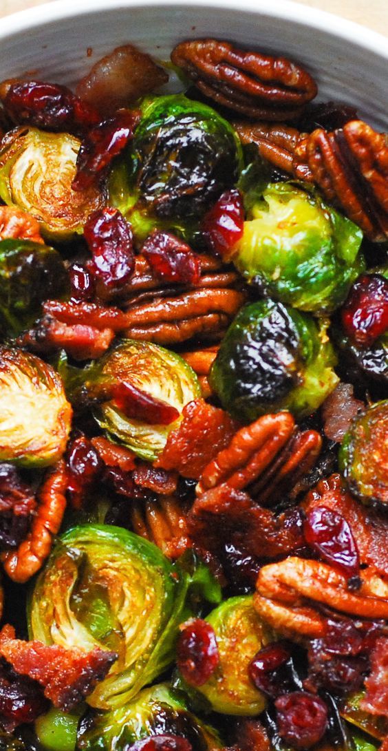 brussel sprouts with pecans and cranberries in a bowl