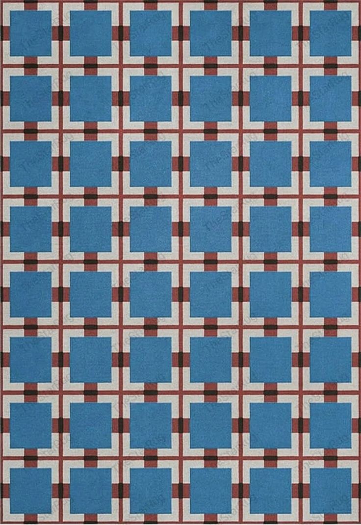 a blue and brown rug with squares on it