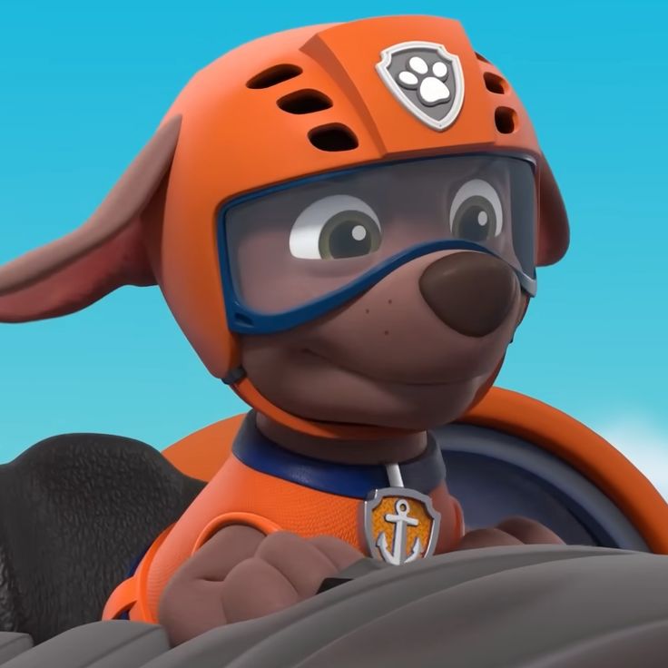 a cartoon dog wearing an orange helmet and goggles