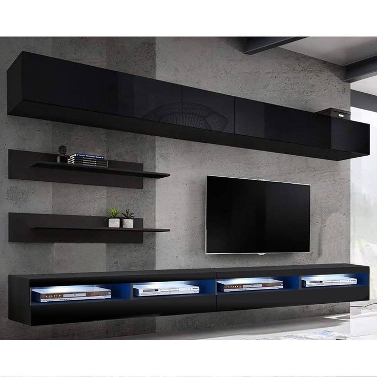 a large tv mounted to the side of a wall