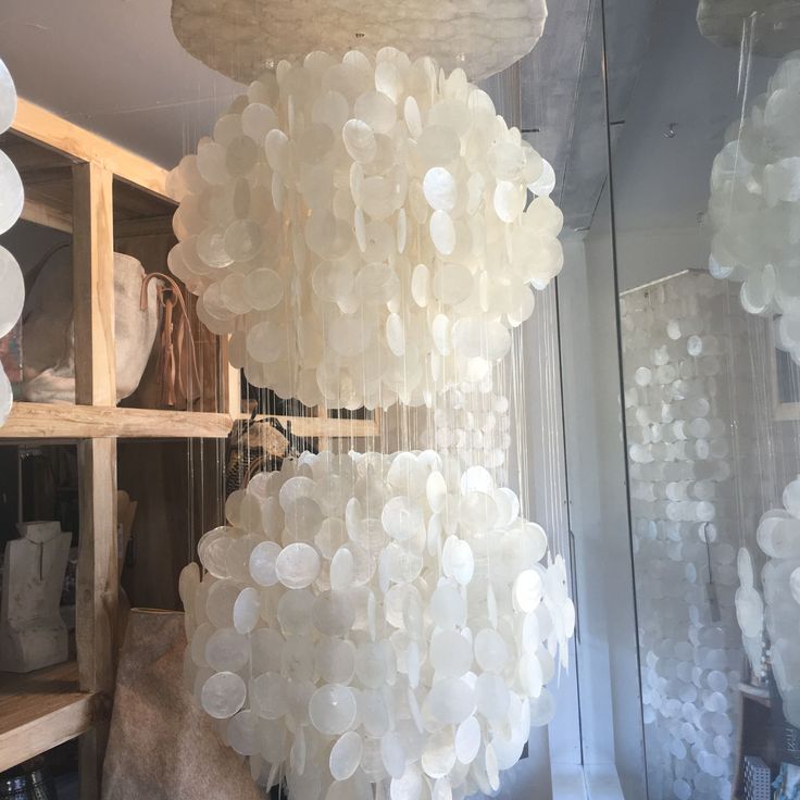 a large chandelier made out of plastic cups