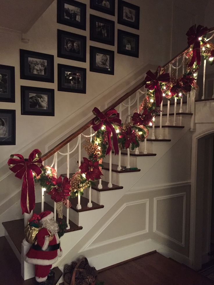 christmas decorations on the banisters and stairs