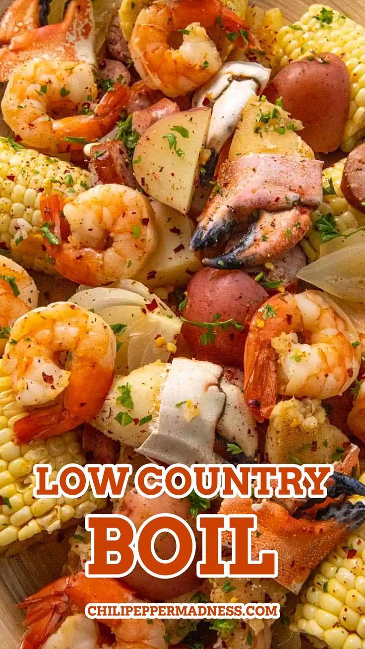 a plate filled with shrimp, corn and potatoes