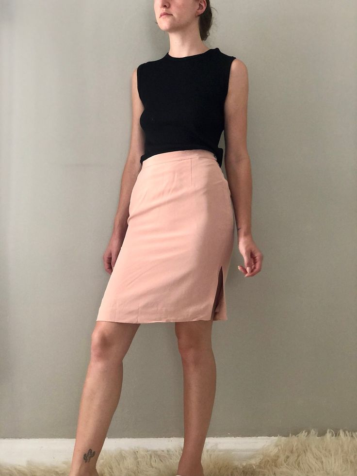 "Gorgeous 100% silk skirt in the perfect blush shade.  Super soft matte finish to the silk.  Fully lined so its not see-through. Small mark on front bottom hem and some marks from having it hung which could be ironed out! (See photos)  (Measured Flat and Doubled) Waist: 27\" Hips: 37\" Length: 21.5\"" Feminine Lined Skirt For Office, Feminine Lined Pencil Skirt For Work, Feminine Pencil Skirt For Workwear, Pink Knee-length Formal Bottoms, Formal Pink Knee-length Bottoms, Feminine Formal Pencil Skirt, Pink Knee-length Skirt For Formal Occasions, Chic Silk Pencil Skirt For Work, Feminine Lined Pencil Skirt