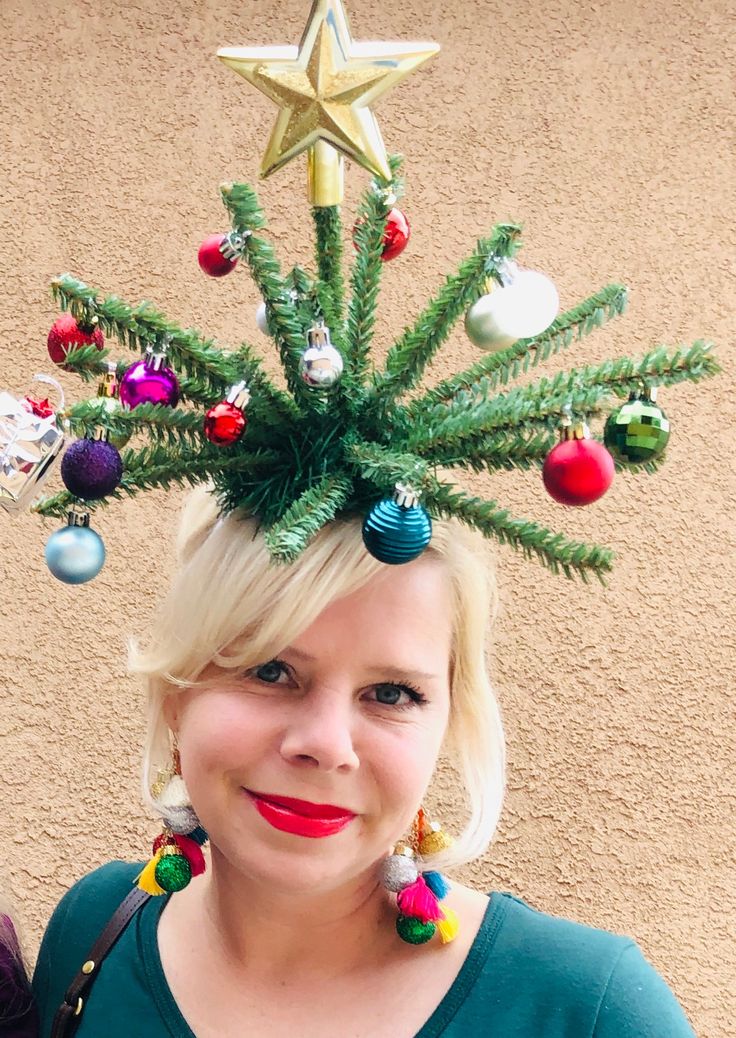 a woman with christmas decorations on her head